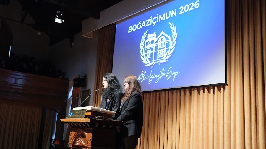 The Albert Long Hall stage with the BoğaziçiMUN 2026 emblem on screen